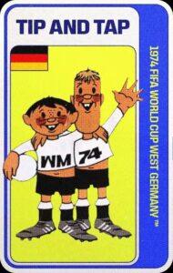 Tip y Tap, mascotas oficiales del Mundial Alemania 1974, que representan a dos niños alemanes de tez clara, uno con cabello rubio y alto y el otro con cabello negro y bajo, abrazados el uno al otro y vestidos ambos con pantaloncillos y calcetas negras, botines grises y camisetas de manga larga de color blanco que, juntas, contienen la leyenda "WM 74". Tap tiene una mano levantada, con la que saluda, mientas que Tip mantienen un balón blanco junto a su cadera.