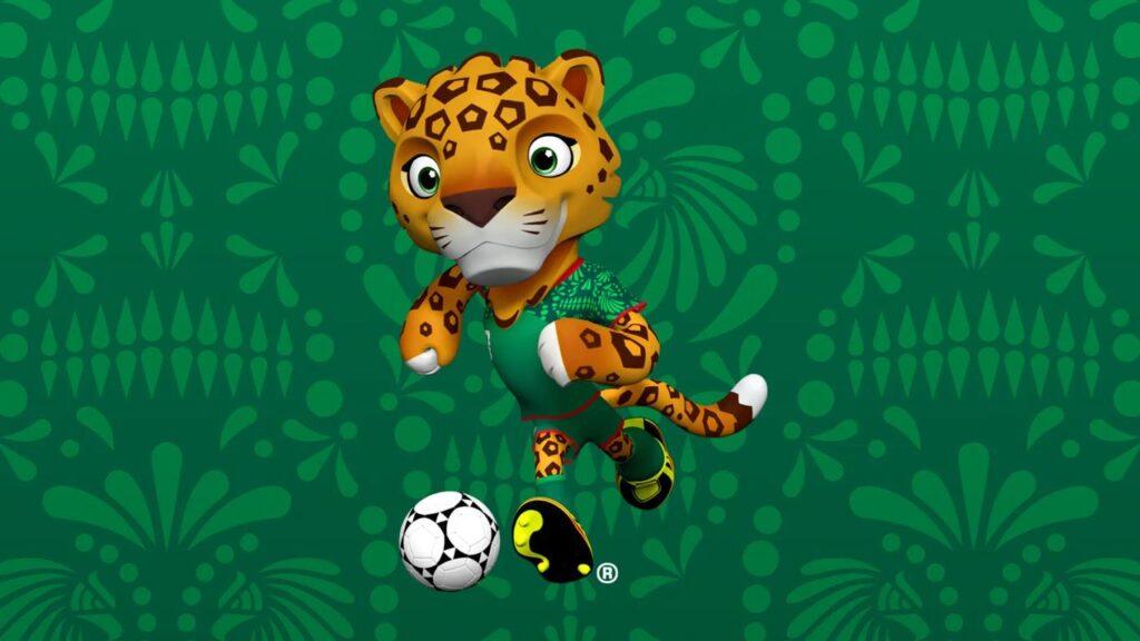 Zayu, mascota oficial del Mundial de la FIFA, México, EE.UU., Canadá 2026, que representa un jaguar mexicano antropomórfico y caricaturizado digitalemente, vestido con una equipación verde con detalles rojos, y en posición de correr con el balón que tiene a sus pies.